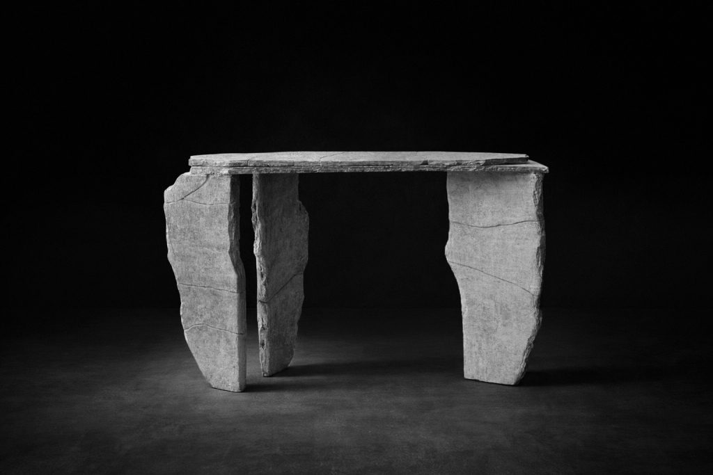 Sculptural Gascogne limestone table by Isac Elam Kaid composed of fractured stone elements assembled into an architectural structure.