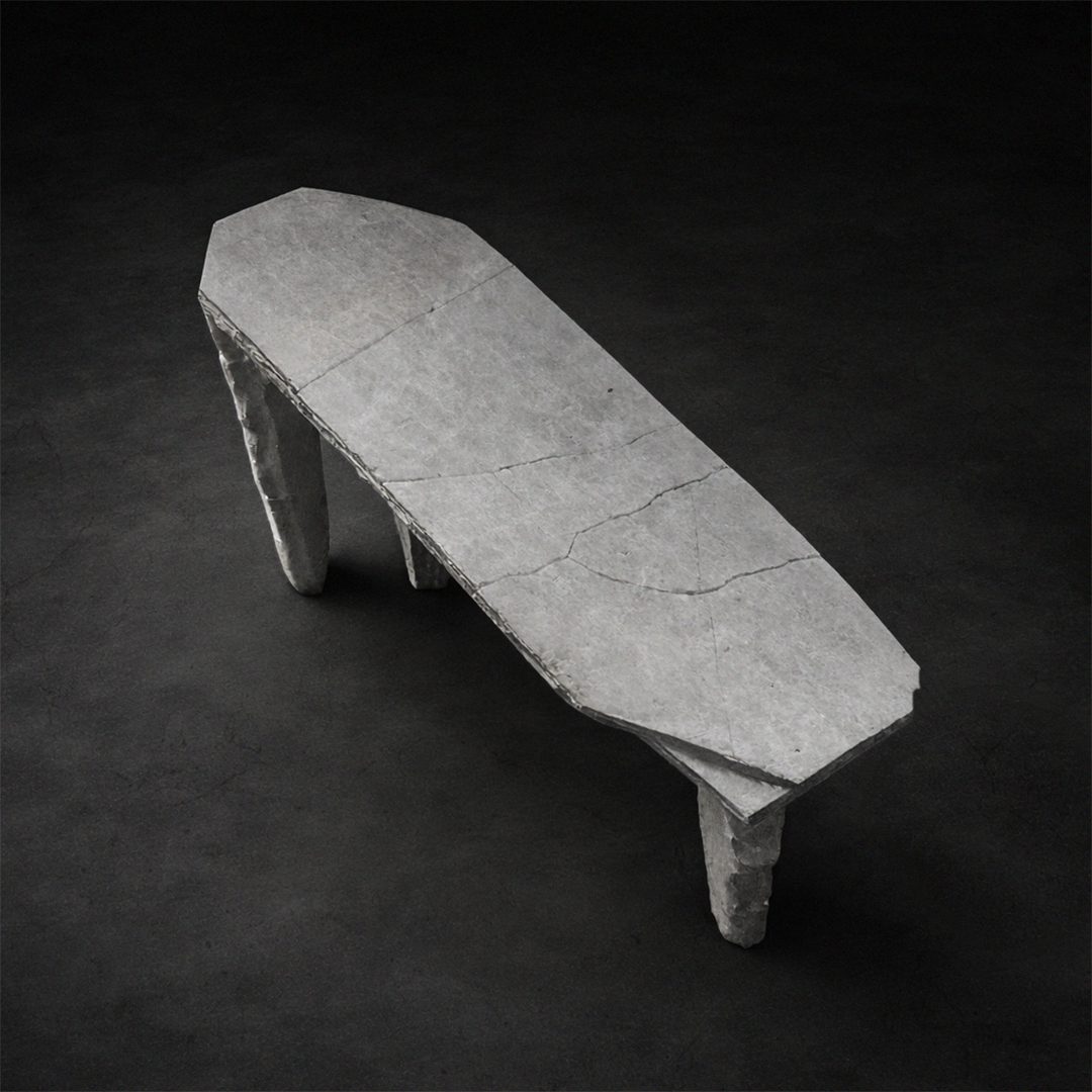 Monumental sculptural stone table with fractured stone supports by Isac Elam Kaid
